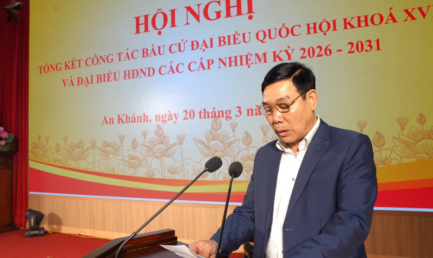 A person standing at a podium with microphones  AI-generated content may be incorrect.