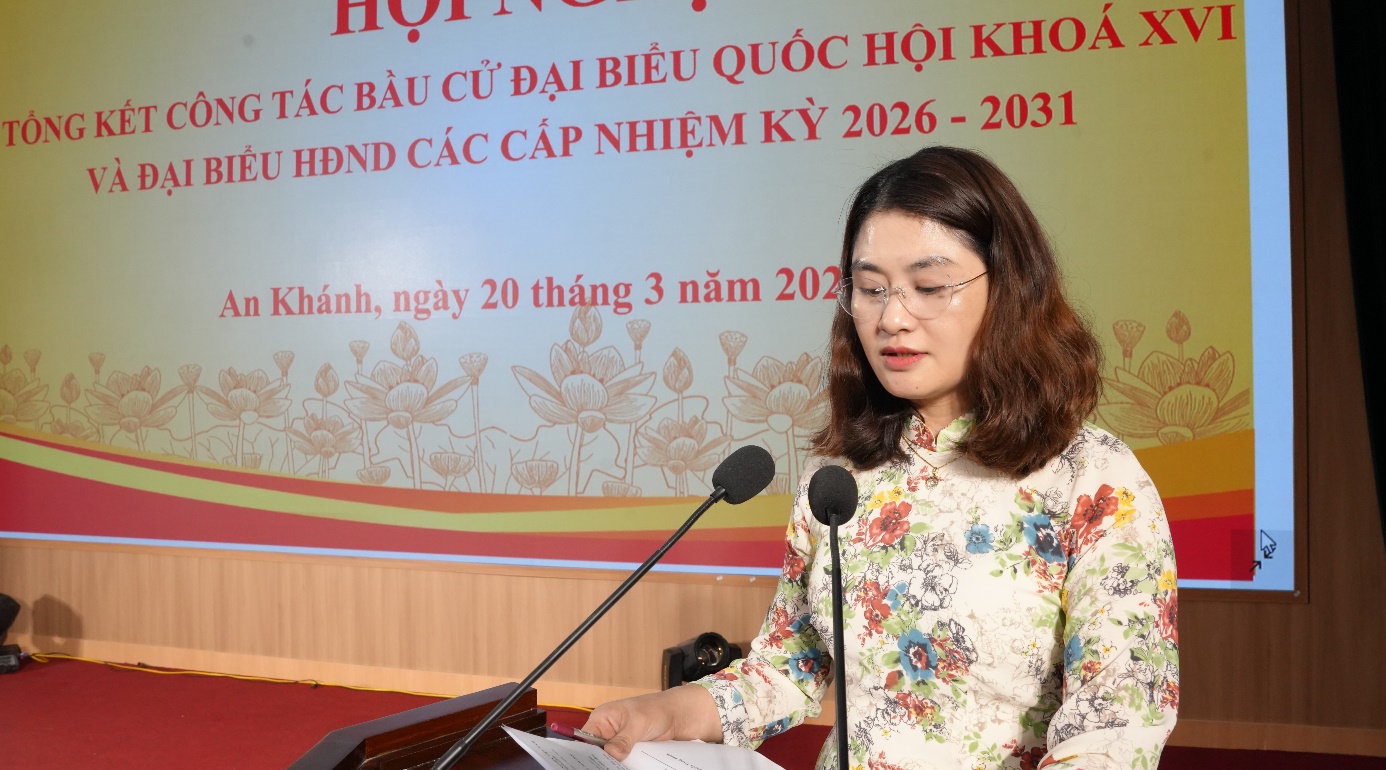 A person standing at a podium with microphones  AI-generated content may be incorrect.