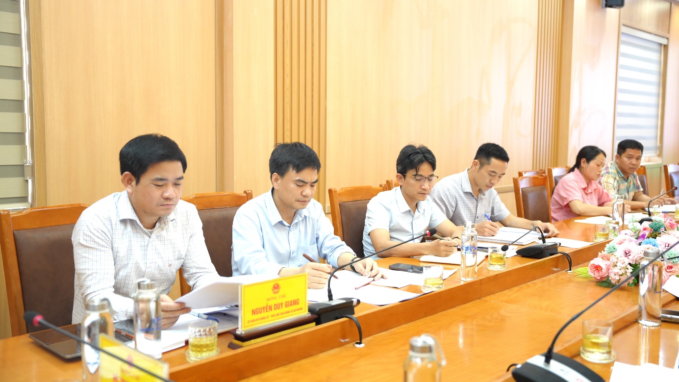 A group of people sitting at a table  AI-generated content may be incorrect.