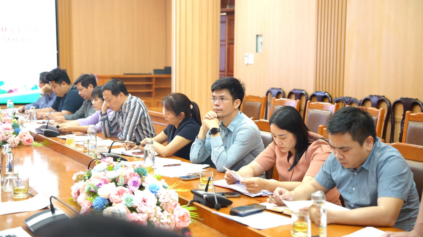 A group of people sitting at a table  AI-generated content may be incorrect.