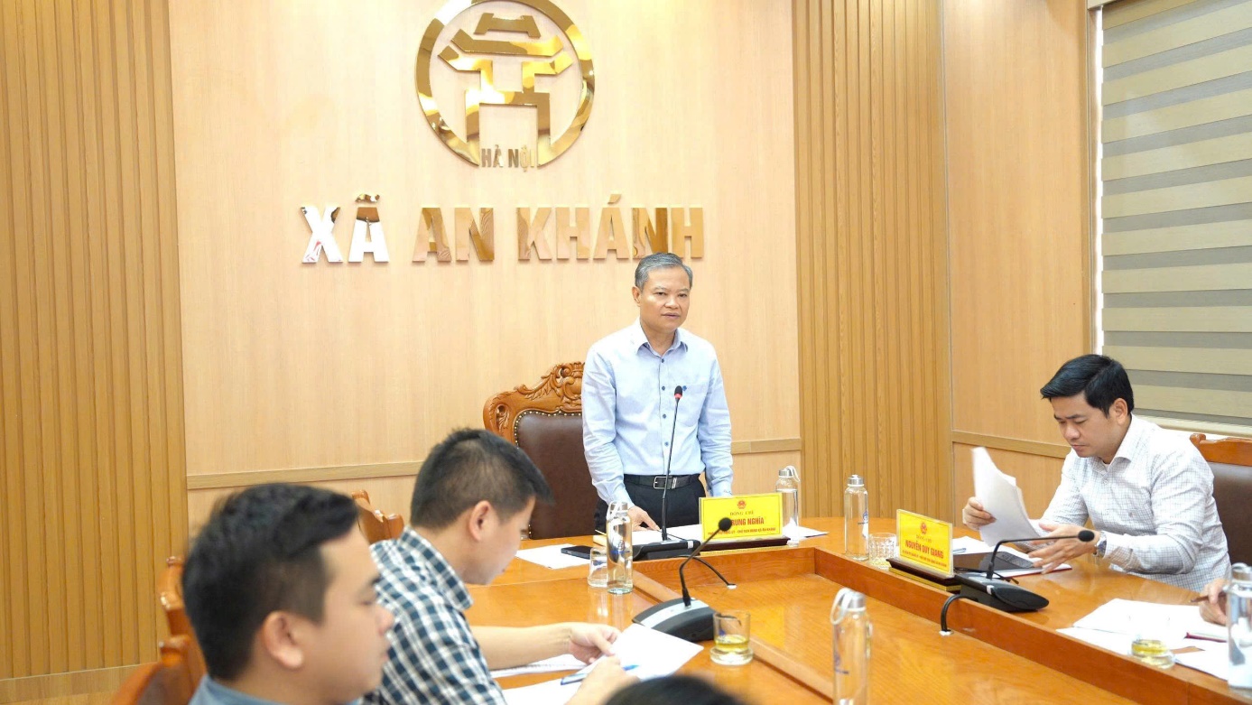 A person standing in front of a table with people around it  AI-generated content may be incorrect.