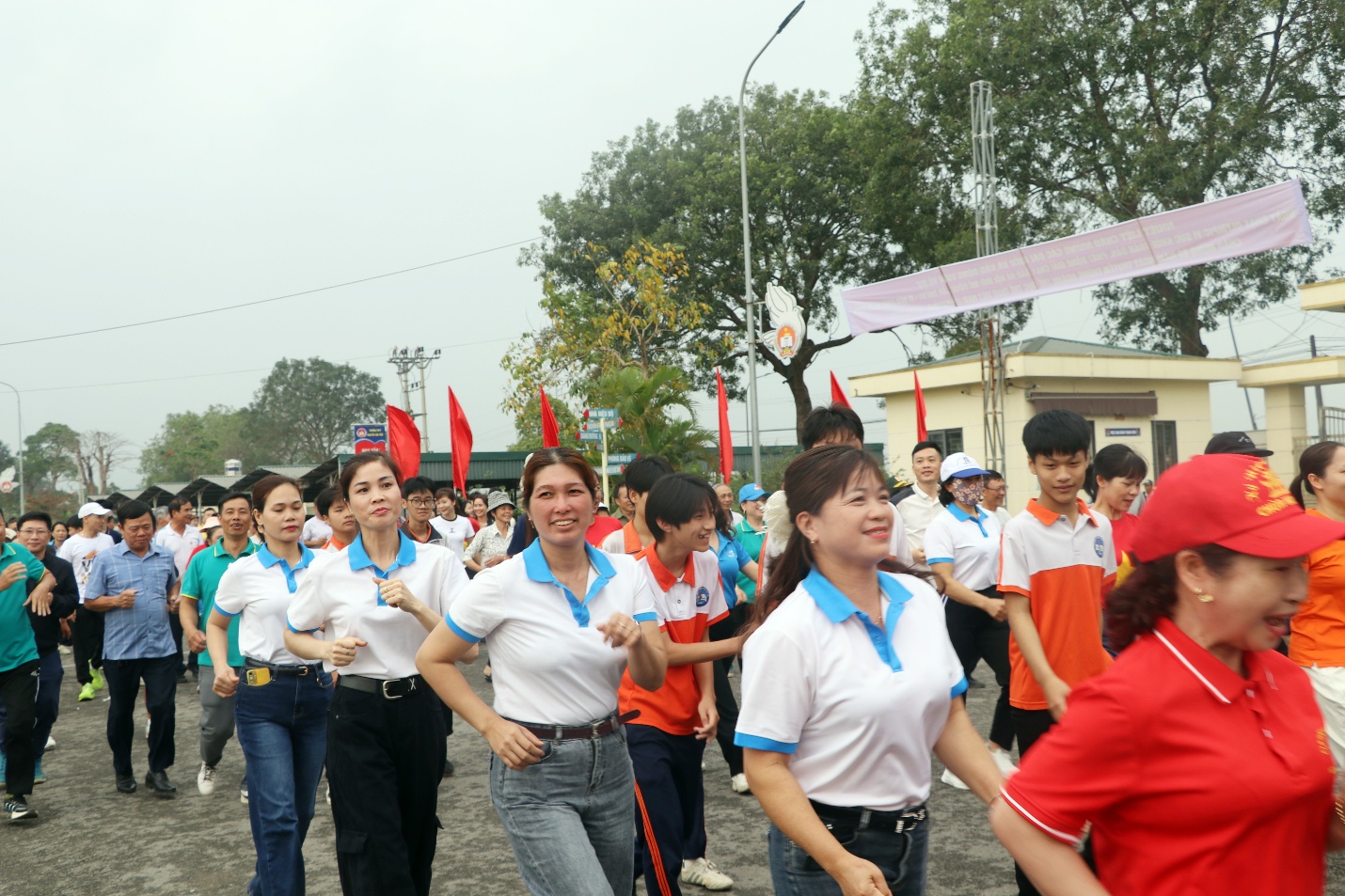 A group of people walking on a street  AI-generated content may be incorrect.