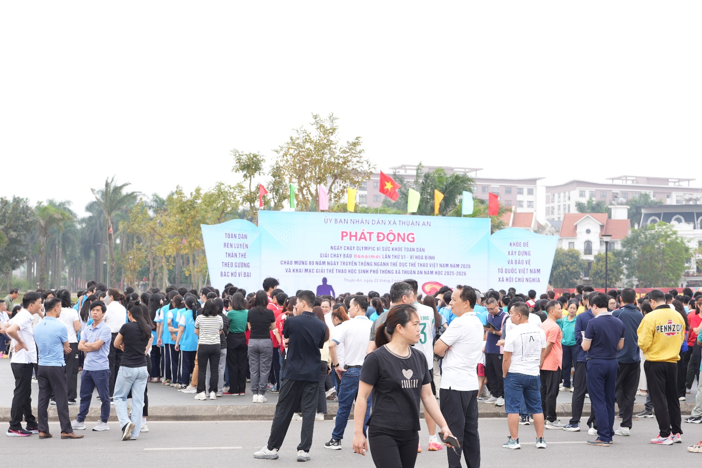 A group of people standing in a parking lot  AI-generated content may be incorrect.