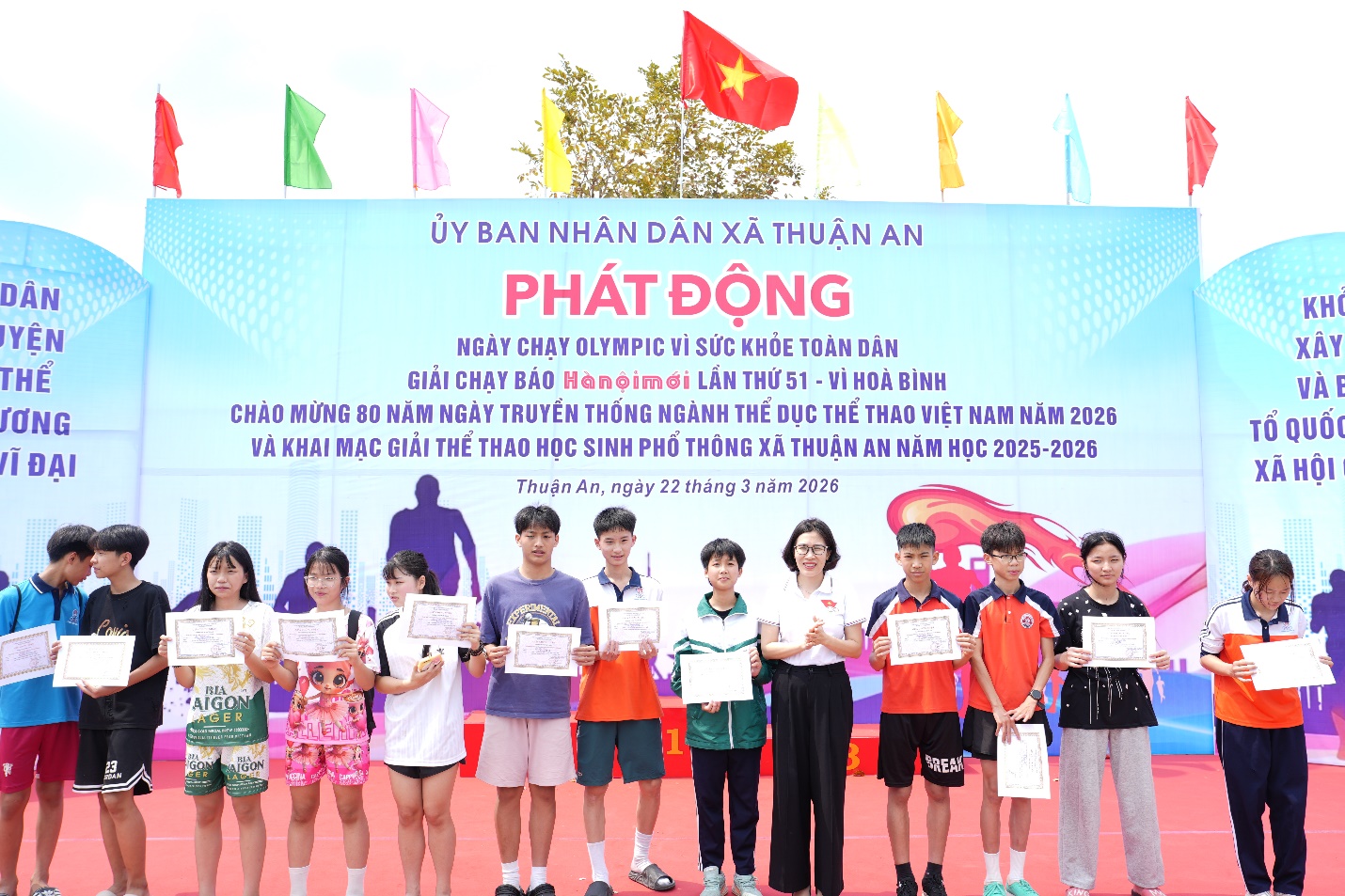 A group of people holding signs  AI-generated content may be incorrect.