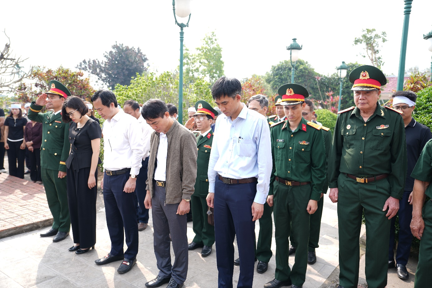 A group of people standing in a line  AI-generated content may be incorrect.