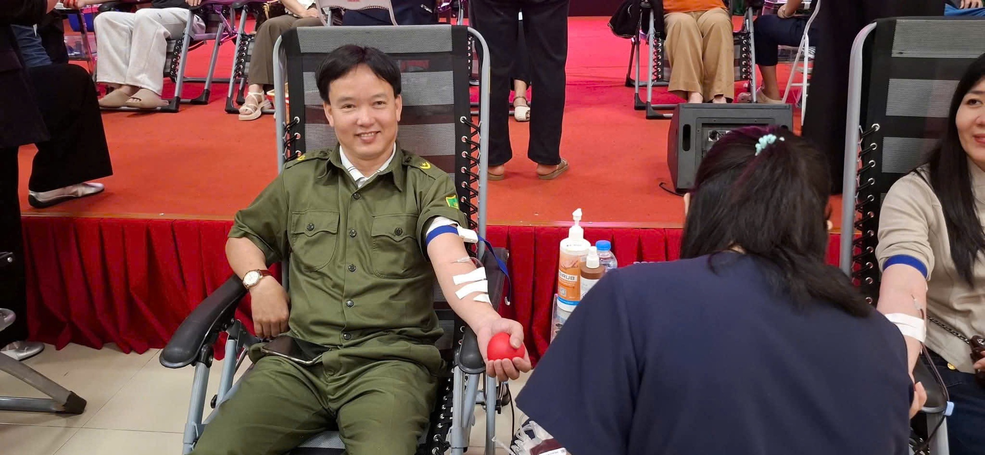 A person sitting in a wheelchair with a red ball in his hand  AI-generated content may be incorrect.