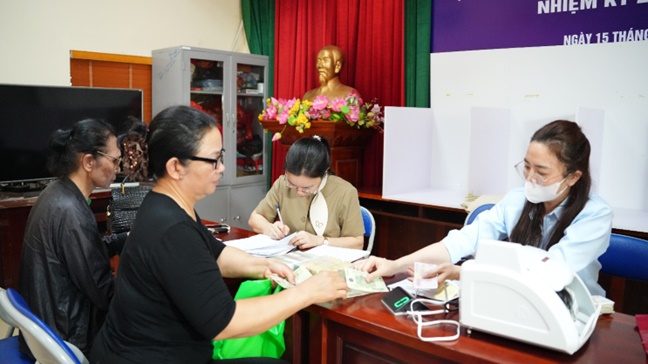 Hoài Đức tiếp tục chi trả tiền cho các hộ có đất nằm trong chỉ giới thu hồi thực hiện dự án đầu tư xây dựng trường THCS Di Trạch- Ảnh 2.