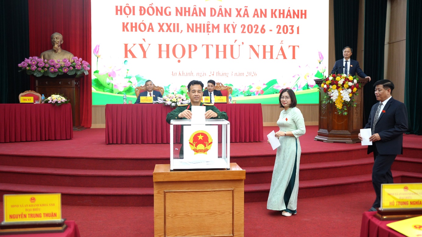 A person and person standing at a podium  AI-generated content may be incorrect.