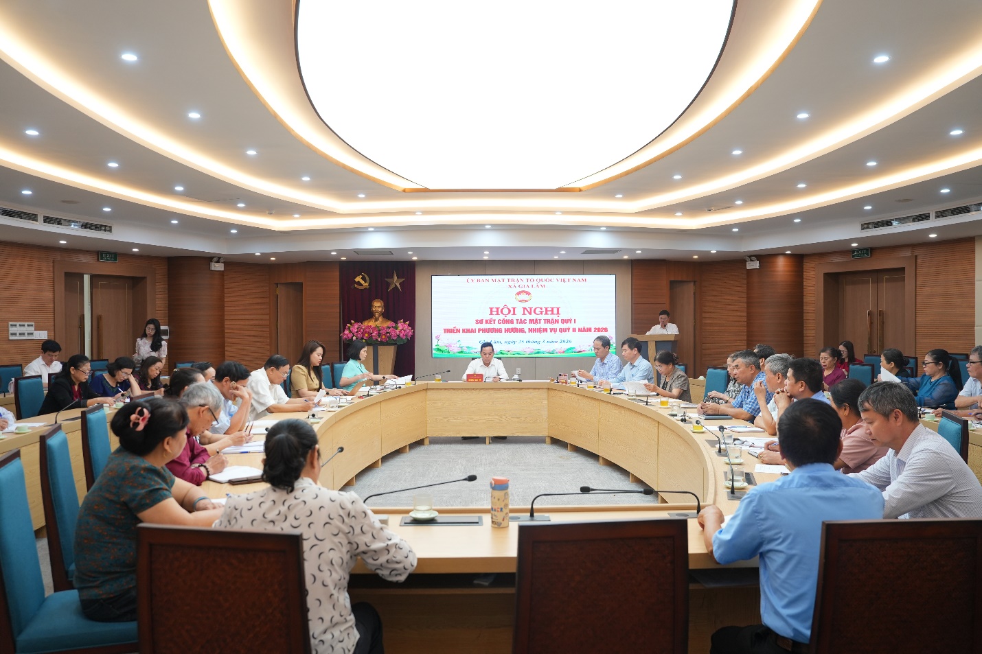 A group of people sitting at a table  AI-generated content may be incorrect.