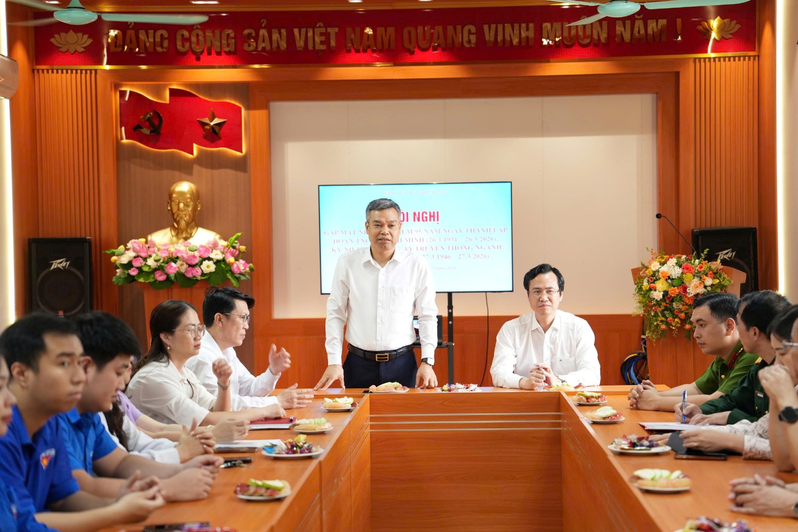 A group of people sitting around a table  AI-generated content may be incorrect.