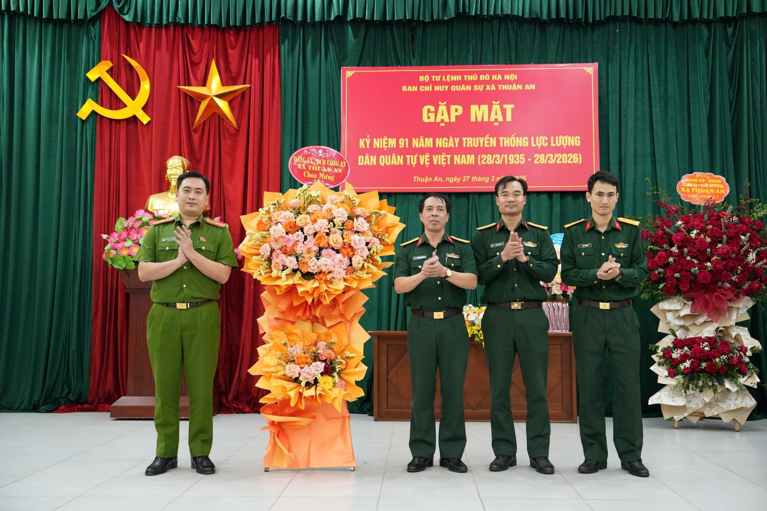A group of men in uniform standing in front of a red sign  AI-generated content may be incorrect.