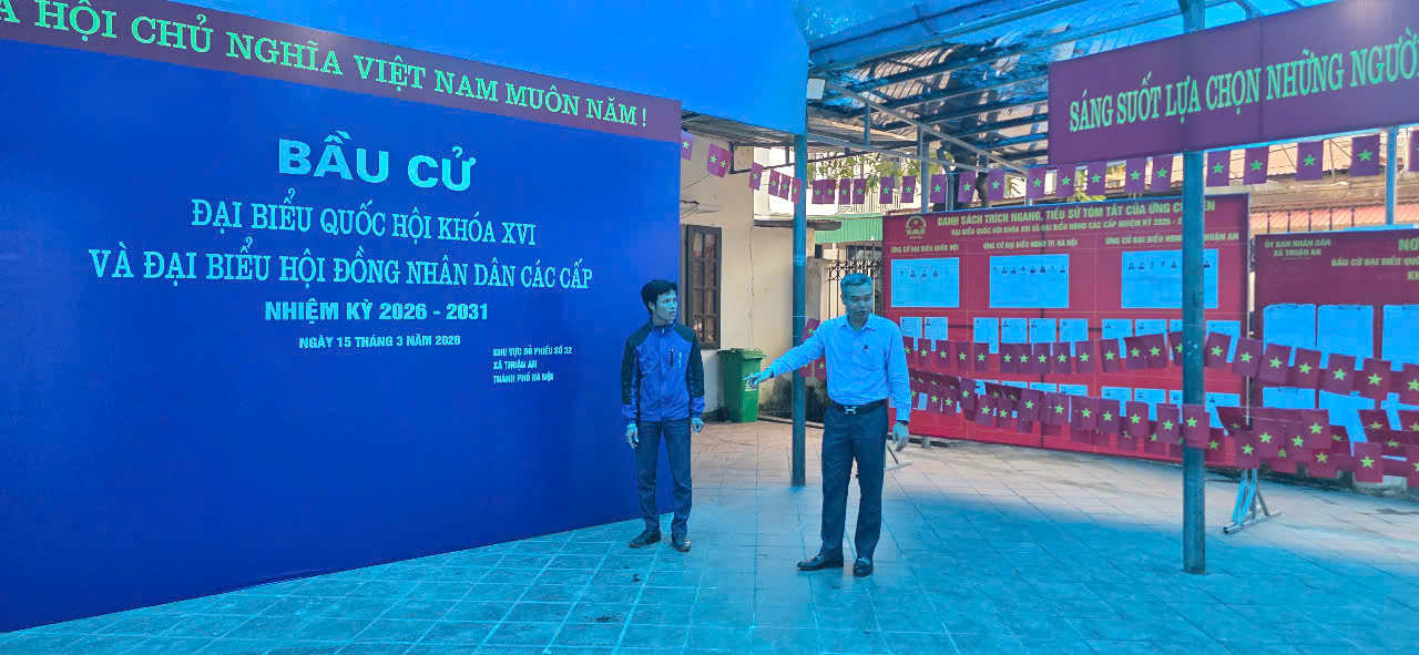 A person and child standing in front of a blue sign  AI-generated content may be incorrect.