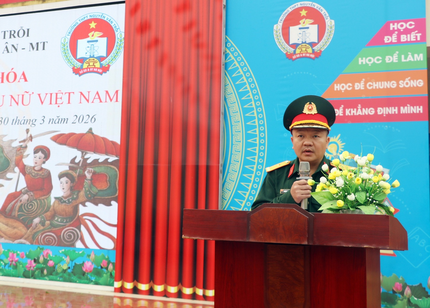 A person in uniform standing at a podium  AI-generated content may be incorrect.