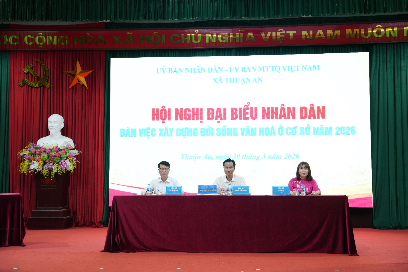 A group of people sitting at a table  AI-generated content may be incorrect.