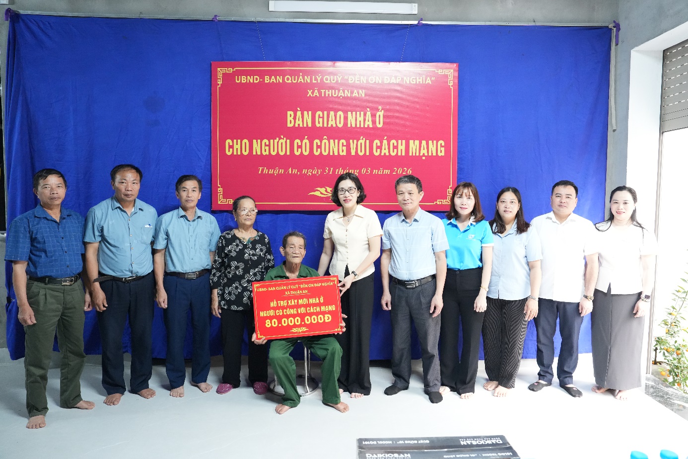 A group of people standing in front of a sign  AI-generated content may be incorrect.