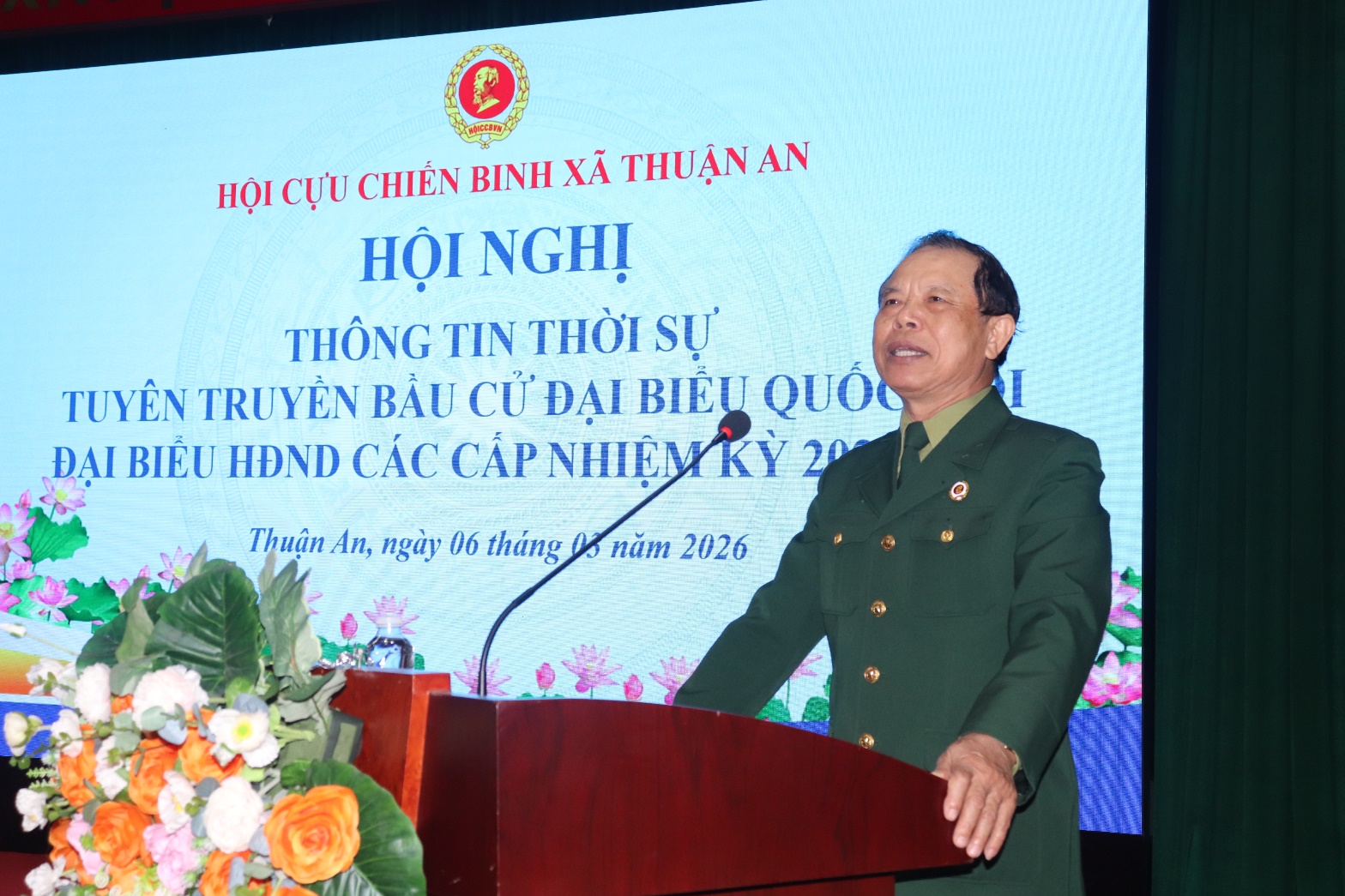 A person standing at a podium  AI-generated content may be incorrect.