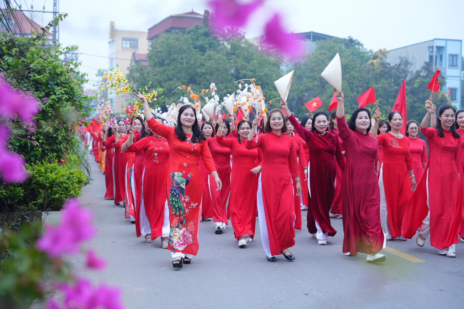A group of women in red dresses  AI-generated content may be incorrect.