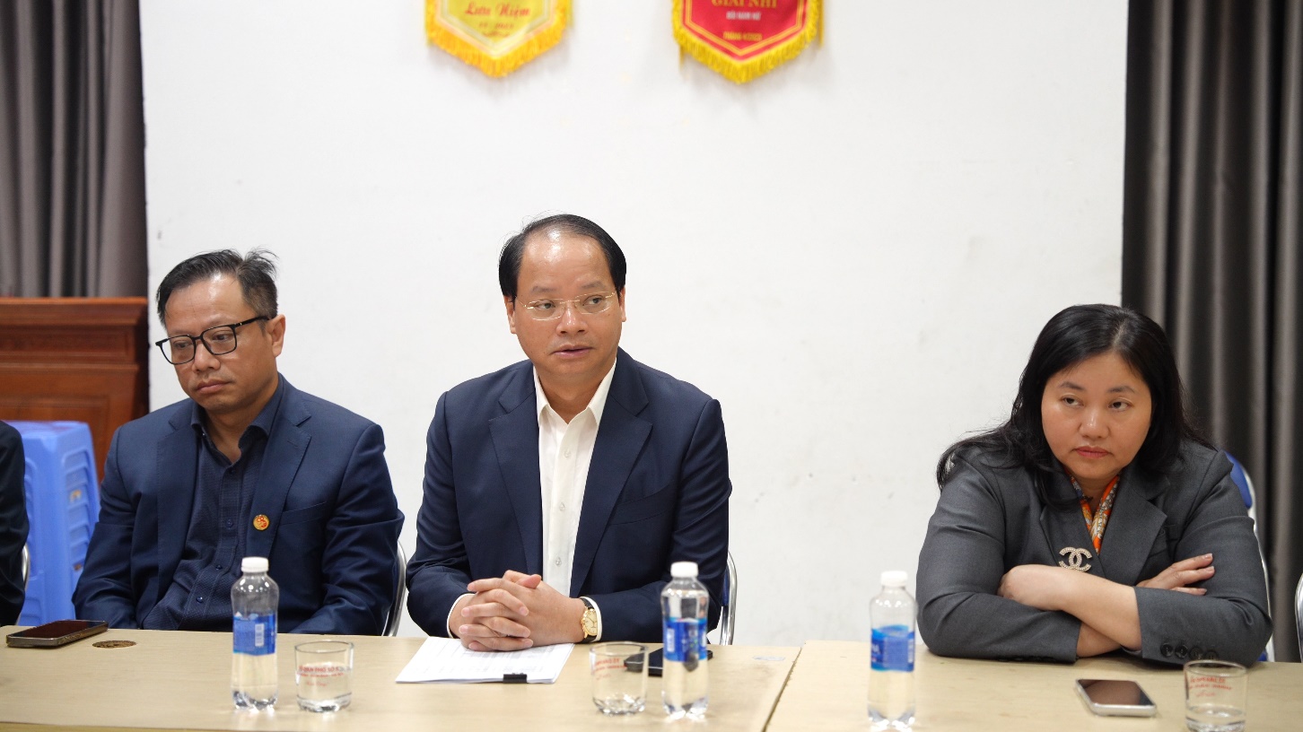 A group of people sitting at a table  AI-generated content may be incorrect.