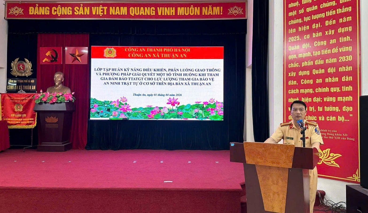 A person standing at a podium  AI-generated content may be incorrect.