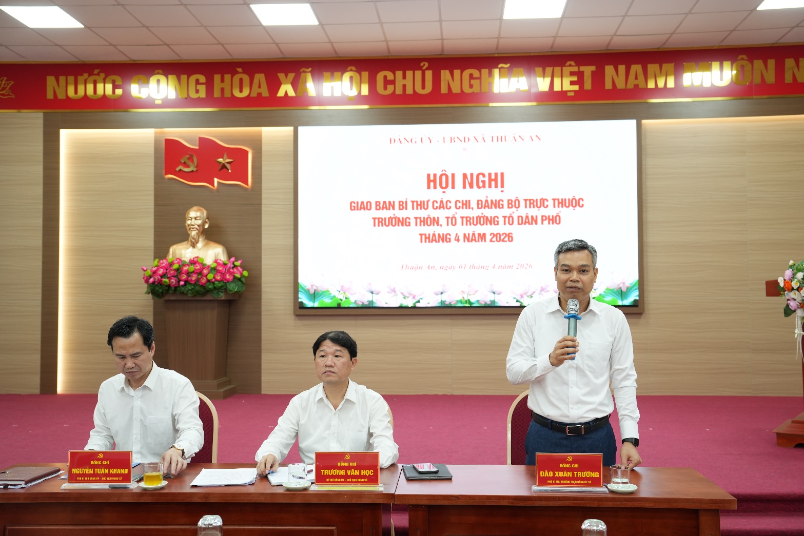 A group of men sitting at a table  AI-generated content may be incorrect.