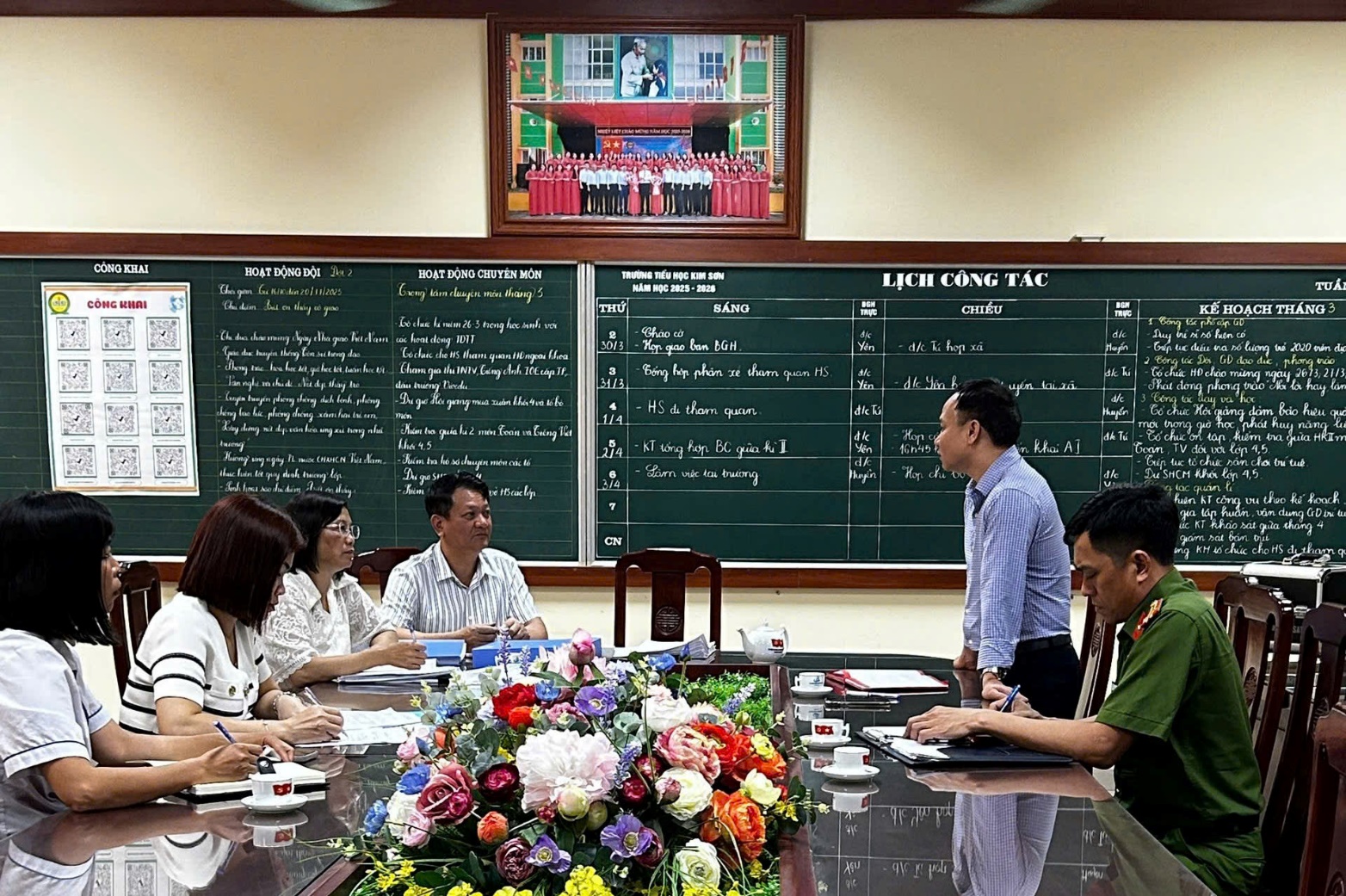 A group of people in a meeting  AI-generated content may be incorrect.