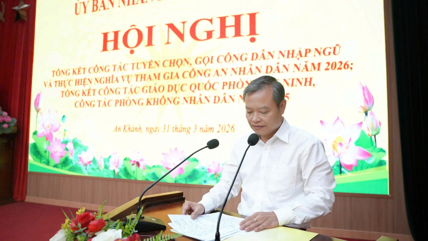 A person sitting at a table with microphones  AI-generated content may be incorrect.