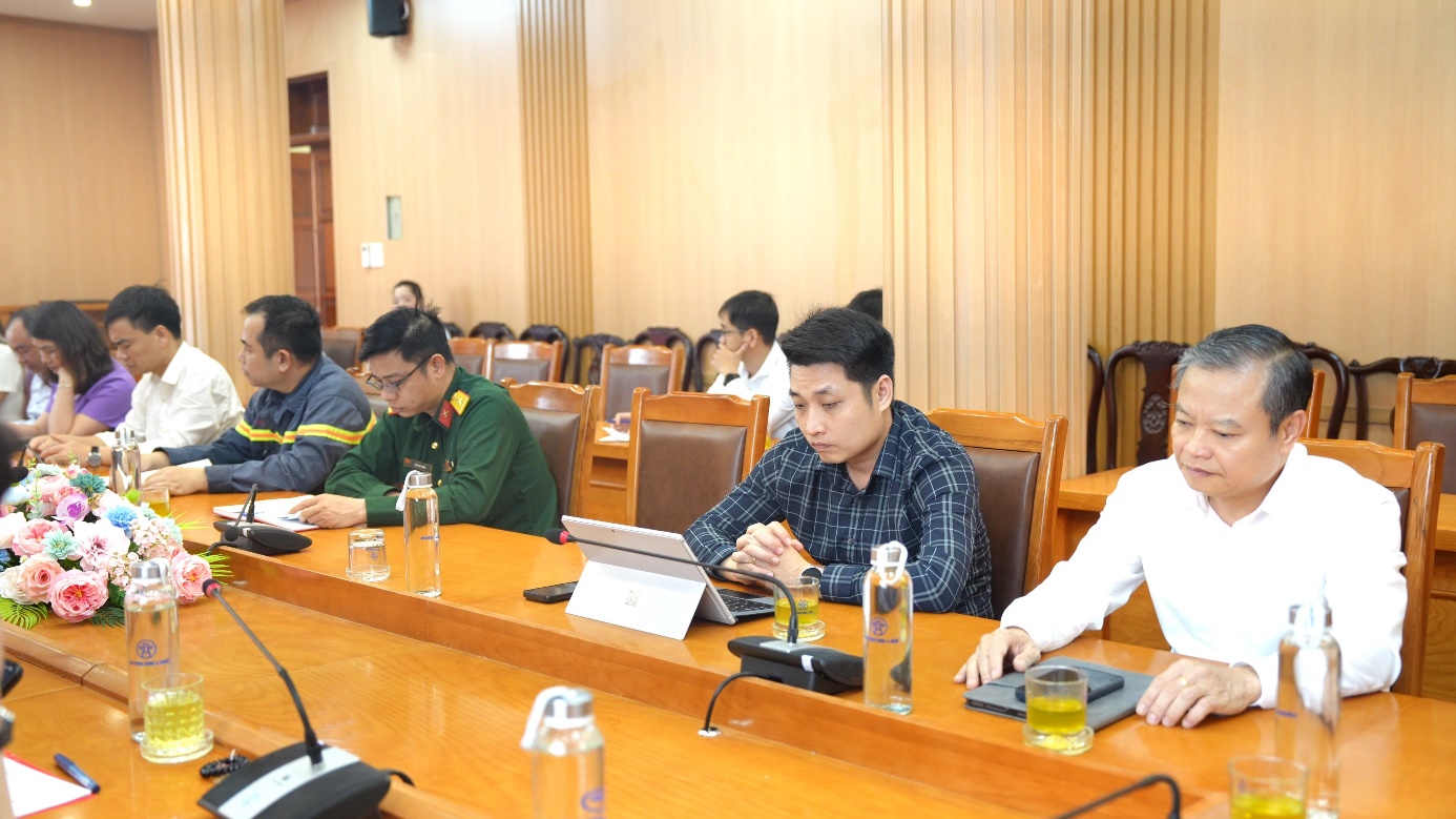 A group of people sitting at a table  AI-generated content may be incorrect.