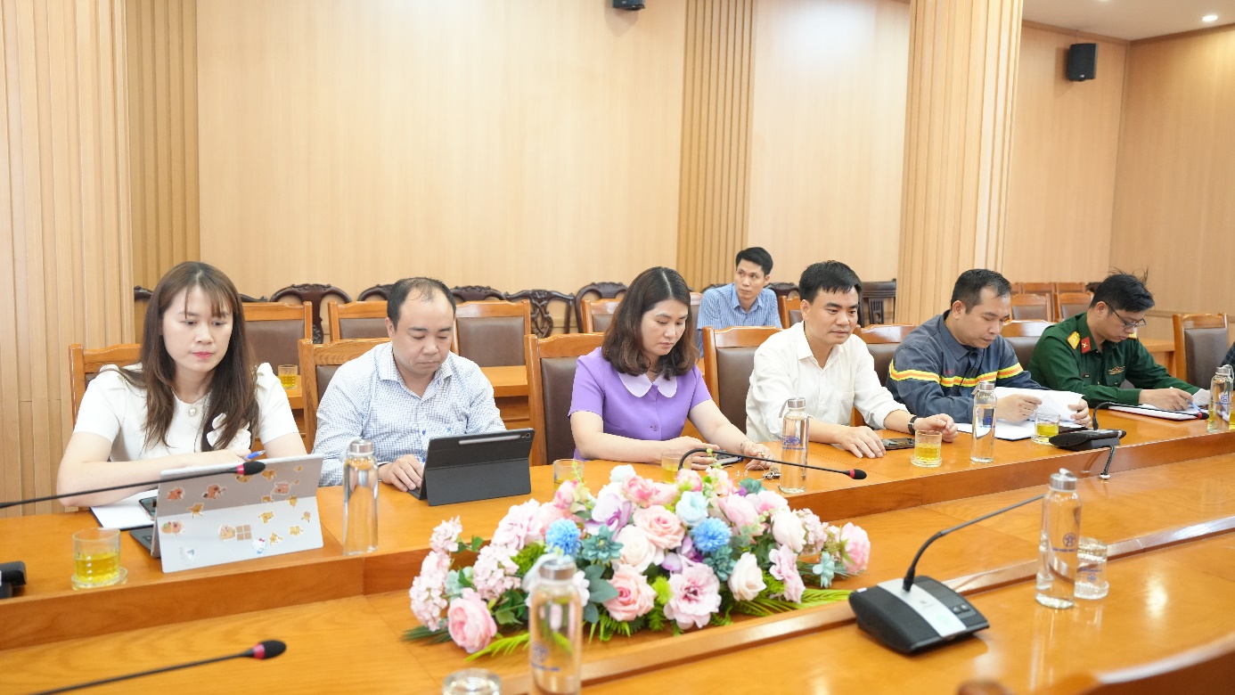 A group of people sitting at a table  AI-generated content may be incorrect.