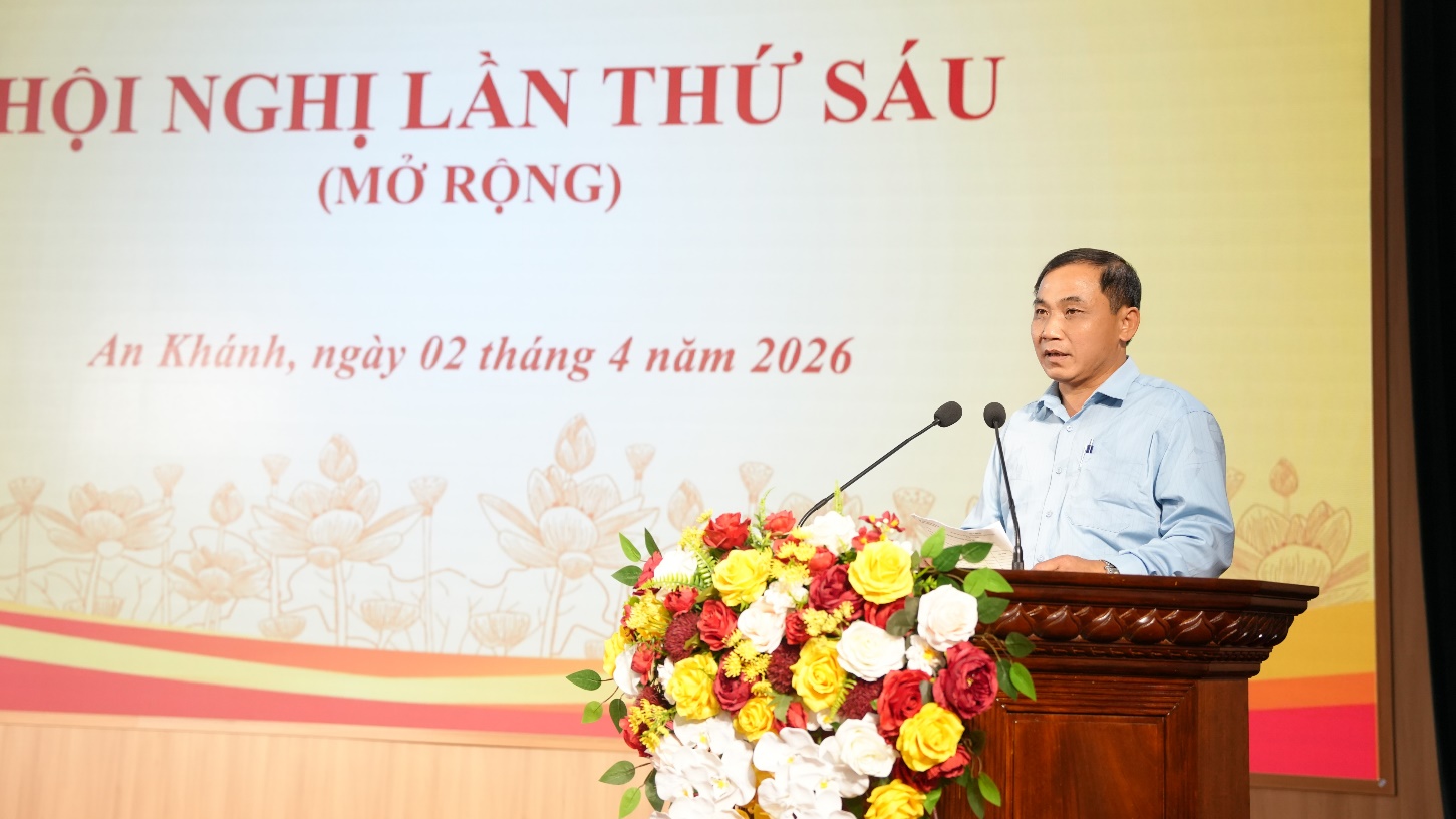 A person standing at a podium with a bunch of flowers  AI-generated content may be incorrect.