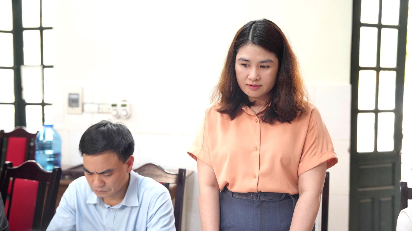 A person standing next to a person  AI-generated content may be incorrect.