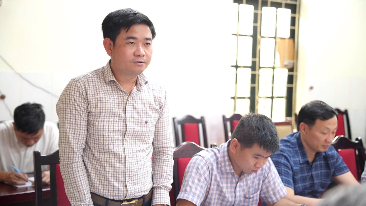 A person standing in front of other people  AI-generated content may be incorrect.