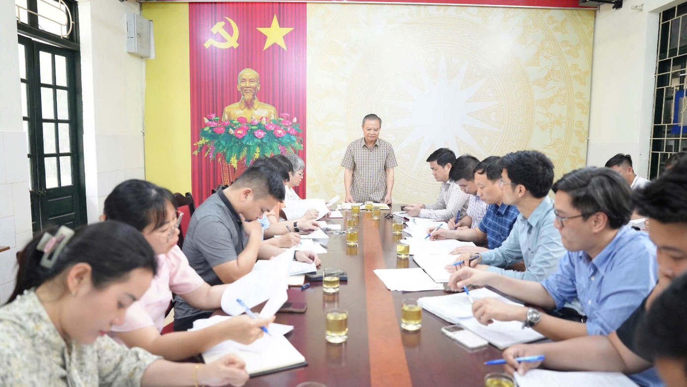 A group of people sitting at a table  AI-generated content may be incorrect.