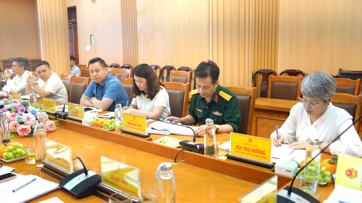 A group of people sitting at a table  AI-generated content may be incorrect.