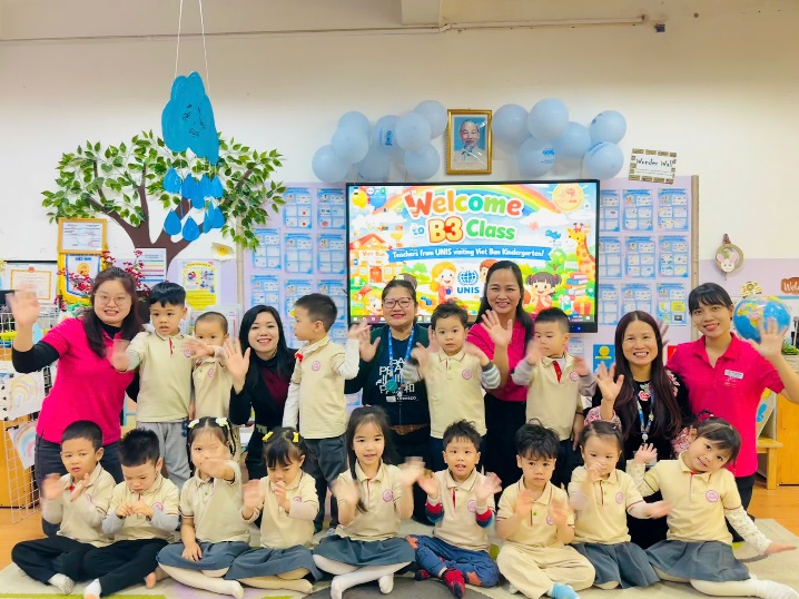 A group of people posing for a photo  Description automatically generated