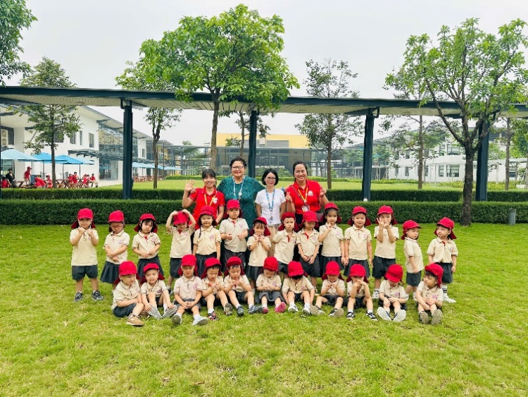 A group of children posing for a photo  Description automatically generated