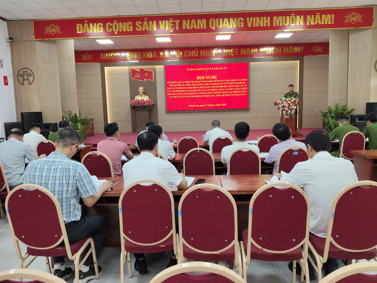 A group of people sitting at a table  AI-generated content may be incorrect.