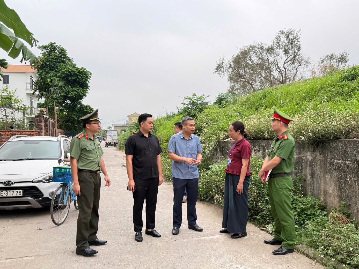 A group of people in uniform standing on a road  AI-generated content may be incorrect.