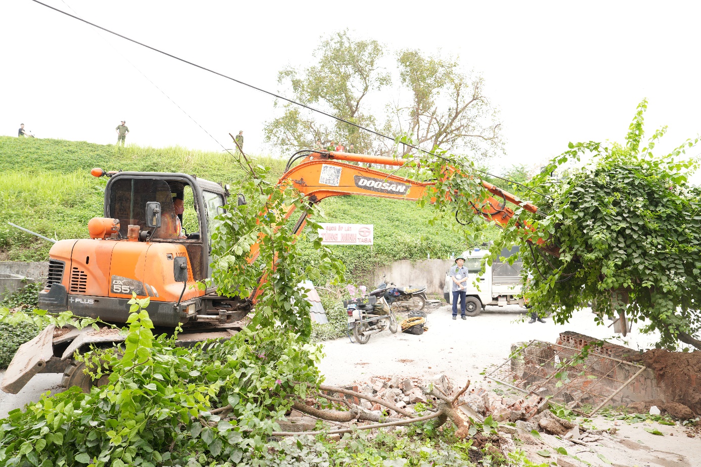 A construction vehicle with a crane  AI-generated content may be incorrect.