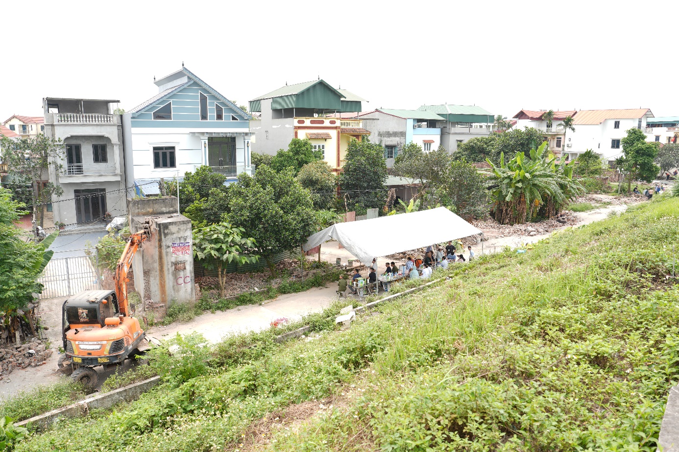 A construction vehicle in a city  AI-generated content may be incorrect.