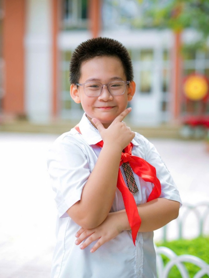 PHẠM KHÁNH MINH - TẤM GƯƠNG SÁNG TRONG PHONG TRÀO "NGƯỜI TỐT – VIỆC TỐT" CỦA MÁI TRƯỜNG TIỂU HỌC THỊNH LIỆT- Ảnh 1.