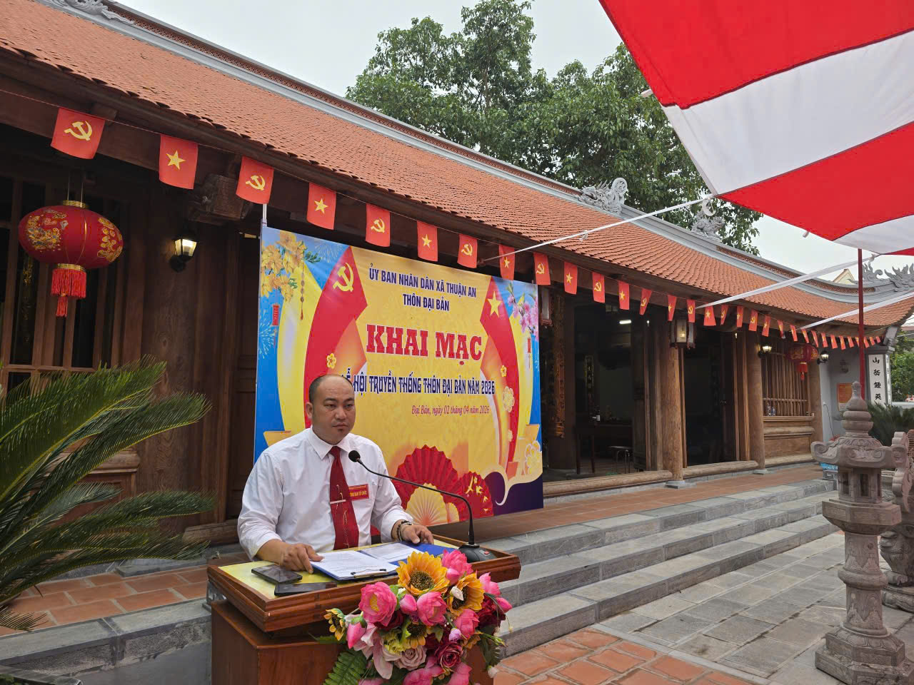 A person at a podium  AI-generated content may be incorrect.