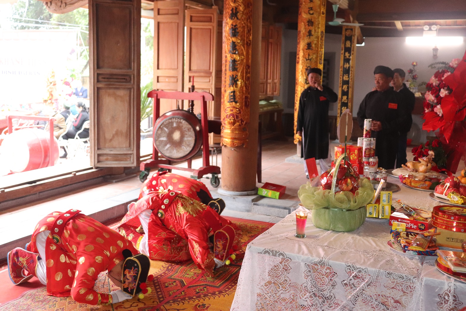 A group of people in red clothes  AI-generated content may be incorrect.