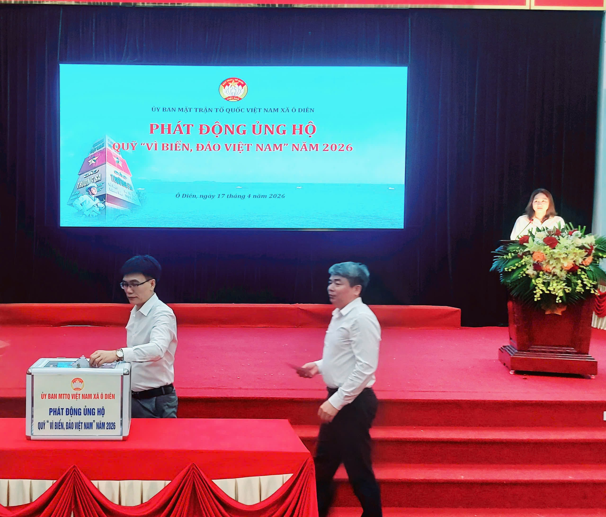 A group of people on a stage  Description automatically generated