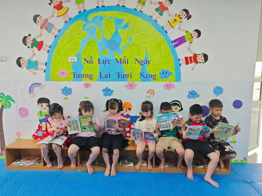 A group of children sitting on benches reading books  AI-generated content may be incorrect.