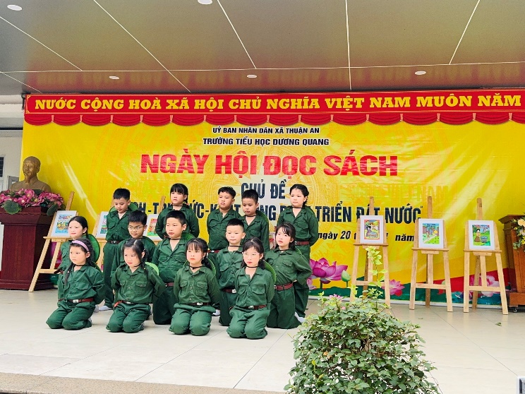 A group of children in green uniforms  AI-generated content may be incorrect.