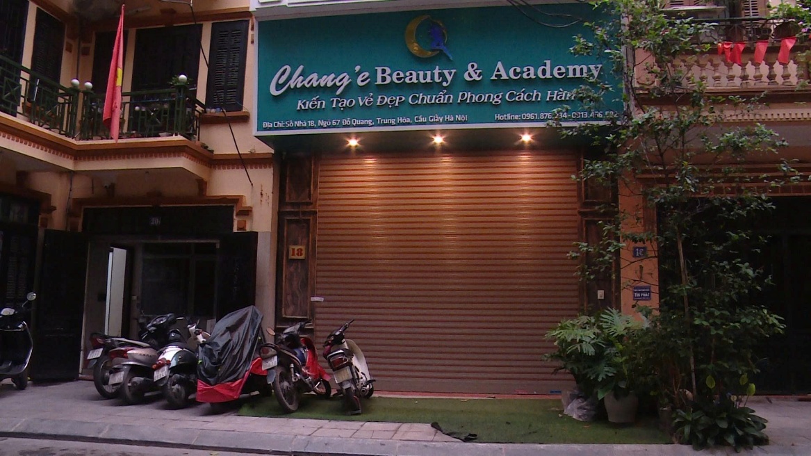 A garage door with a sign  AI-generated content may be incorrect.