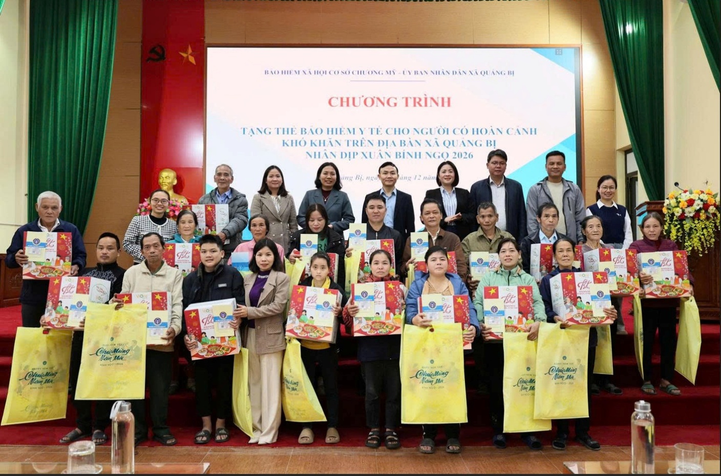 A group of people holding boxes  AI-generated content may be incorrect.