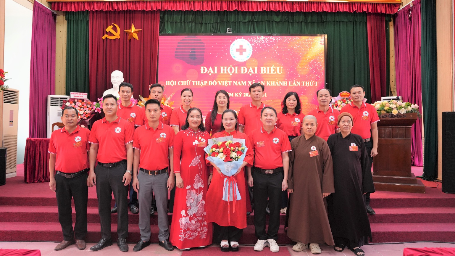 A group of people posing for a photo  AI-generated content may be incorrect.