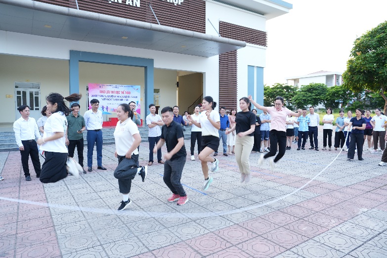 A group of people jumping on a rope  AI-generated content may be incorrect.