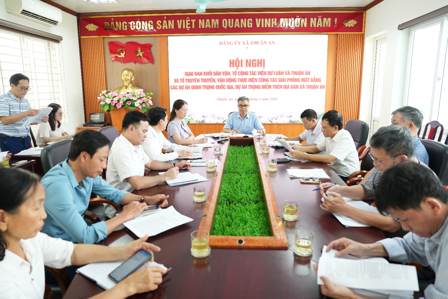 A group of people sitting around a table  AI-generated content may be incorrect.